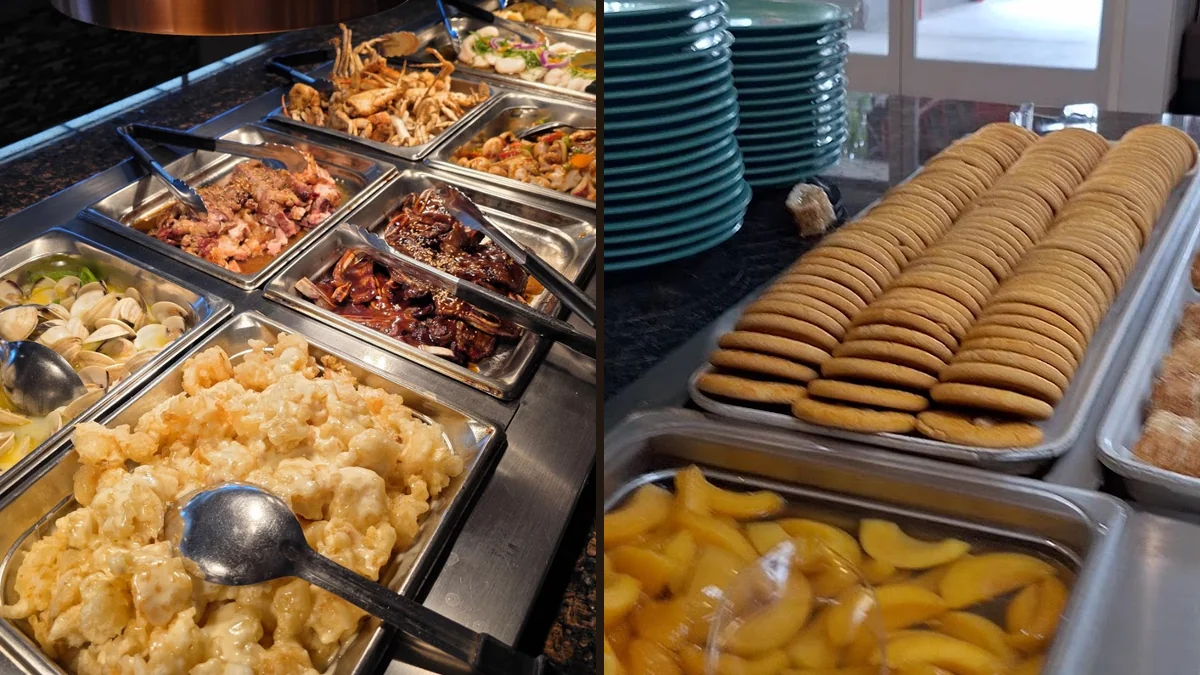 Buffet trays with seafood and Chinese dishes.
